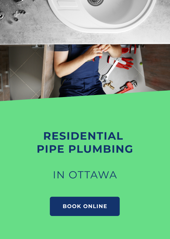A plumber is working under a sink, fixing the pipes plumbing